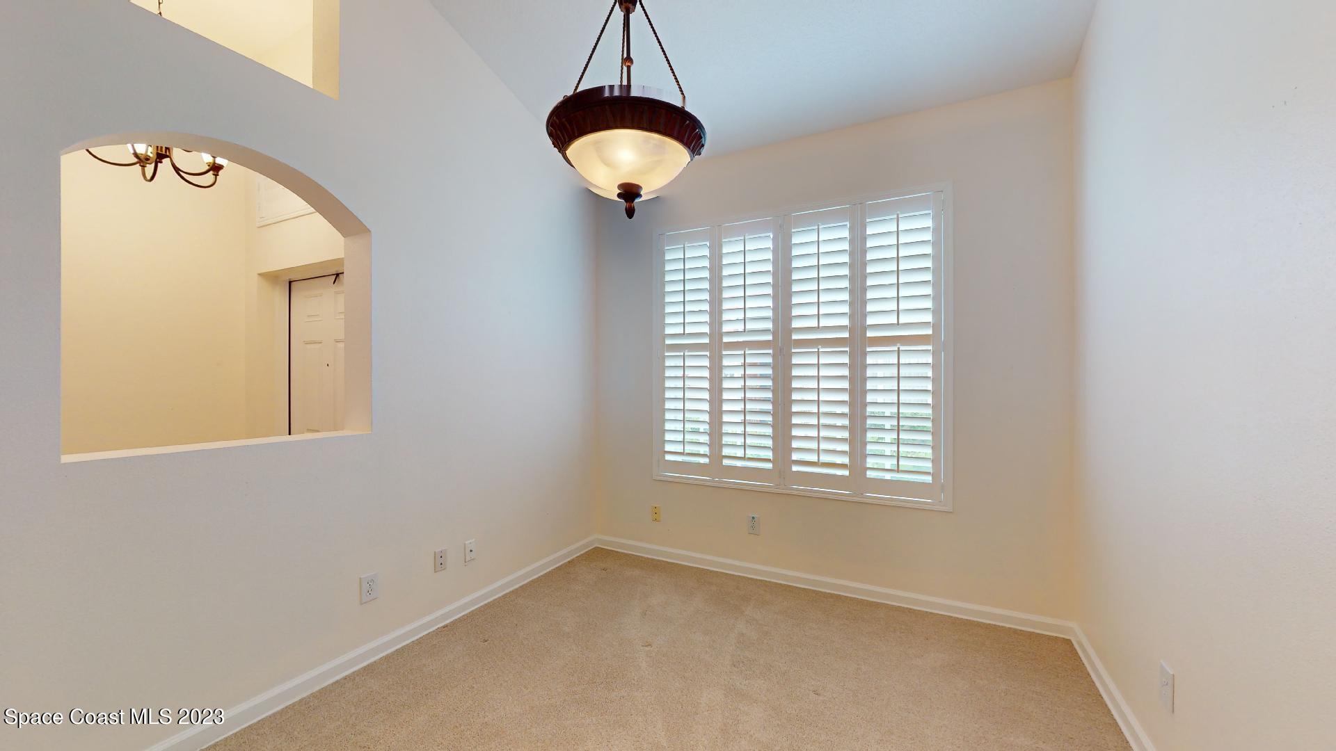 3151 Arden Circle Melbourne, FL 32934 - Photo 17 of 32 a view of a livingroom with a window
