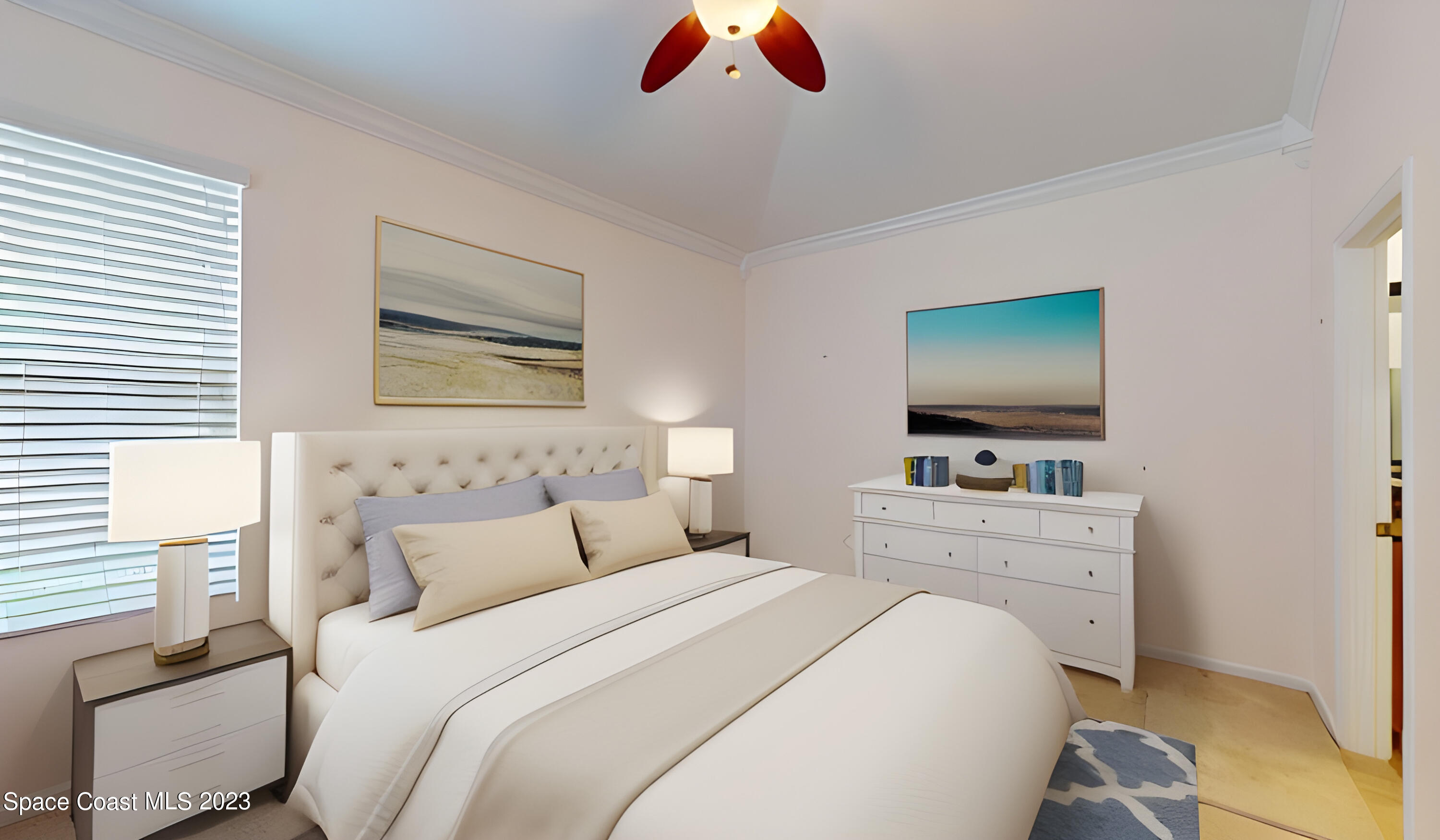 3151 Arden Circle Melbourne, FL 32934 - Photo 18 of 32 a bedroom with a bed and a flat screen tv