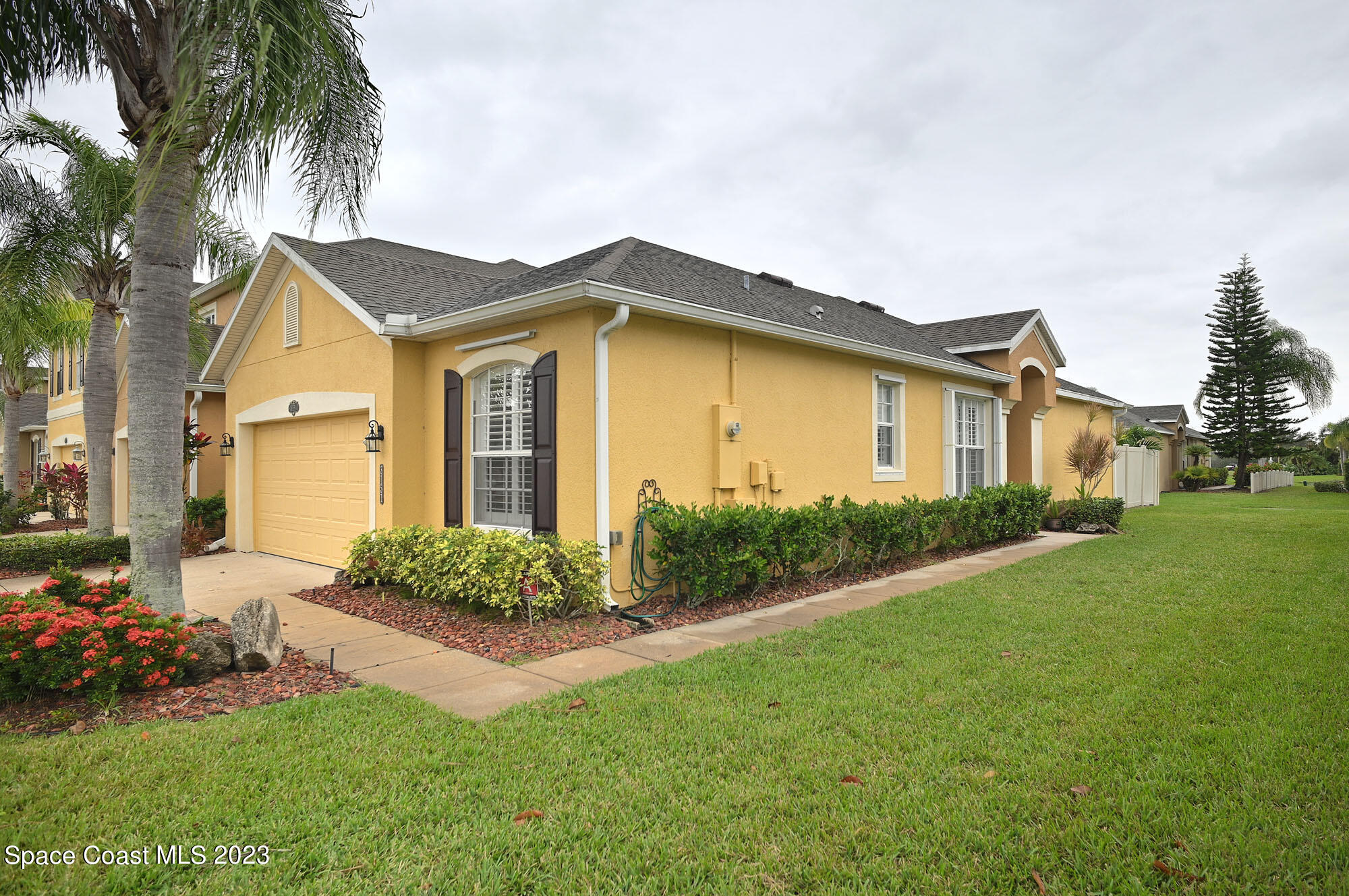 3151 Arden Circle Melbourne, FL 32934 - Photo 3 of 32 a front view of house with yard and green space