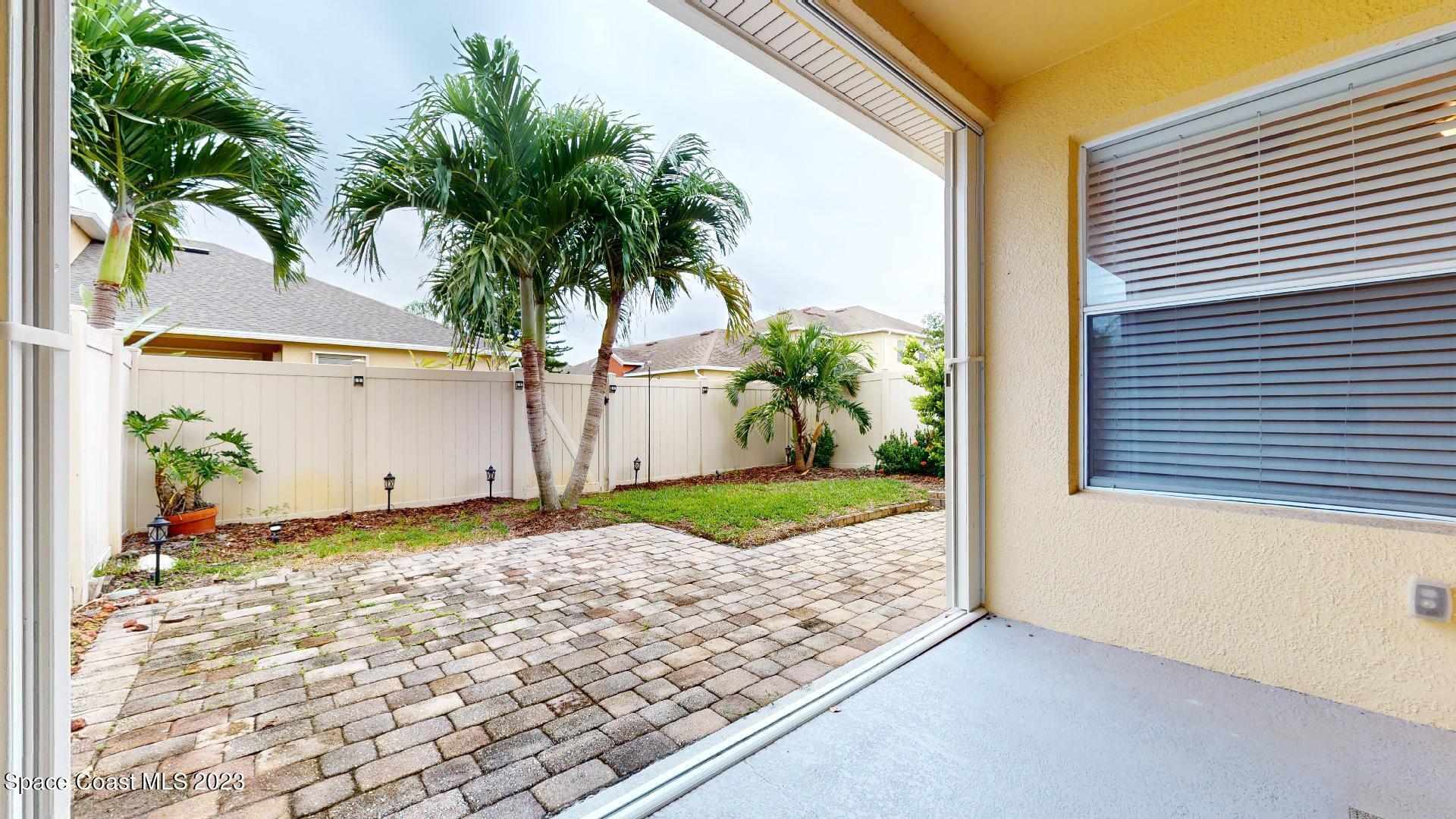 3151 Arden Circle Melbourne, FL 32934 - Photo 31 of 32 a view of backyard of a house
