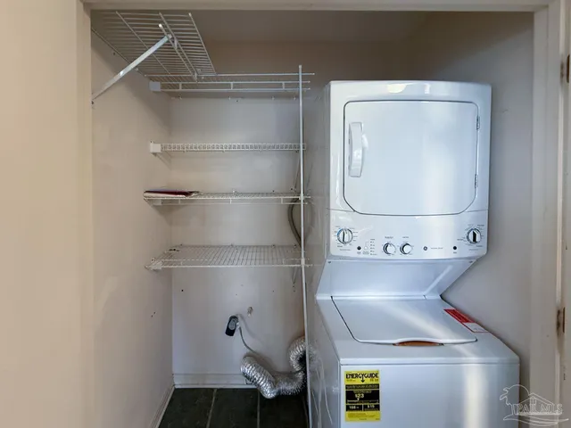 a close view of utility room with washer and dryer