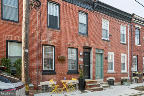 a front view of a building with street