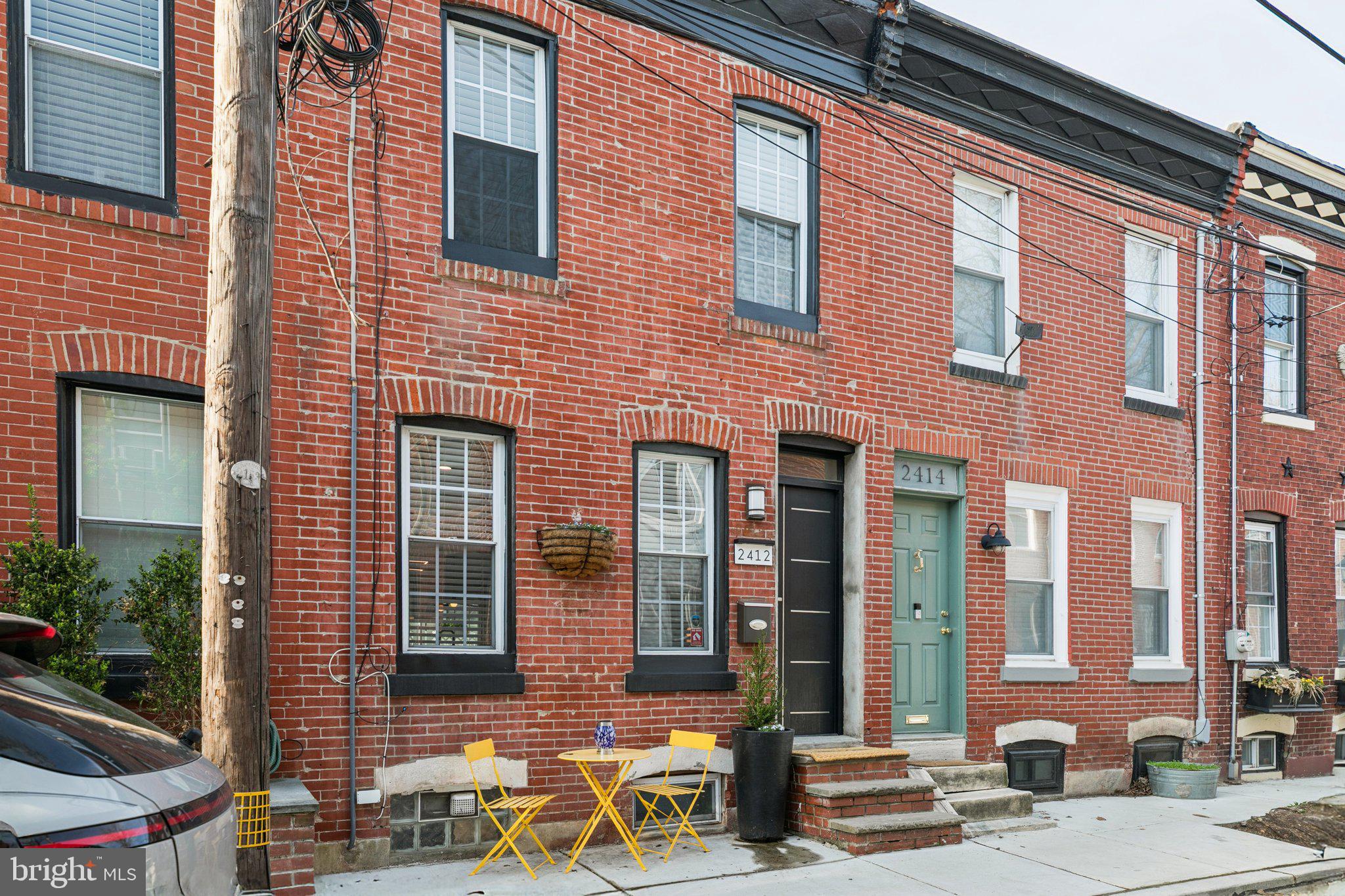 a front view of a building with street