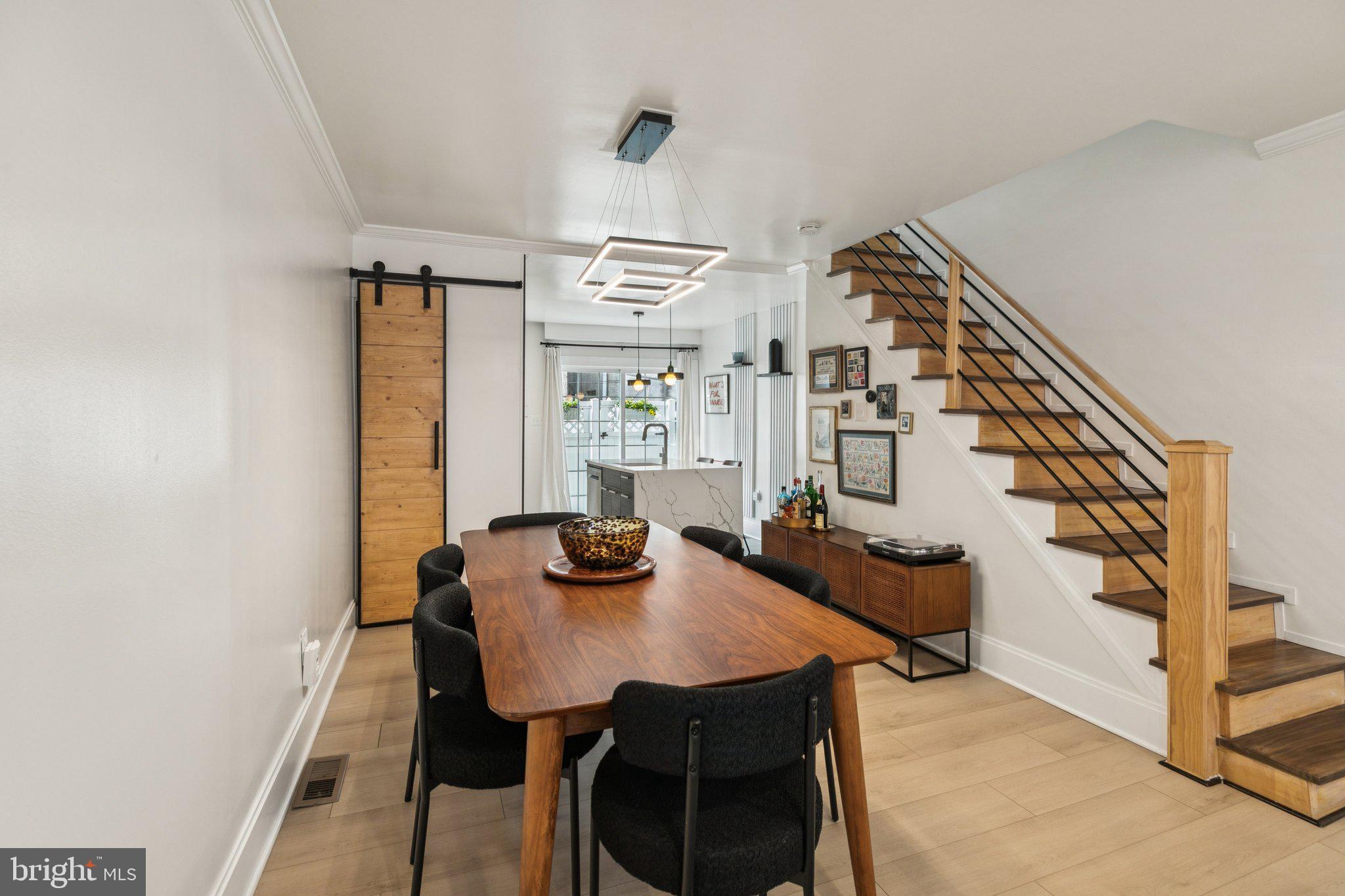 2412 Madison Square Philadelphia, PA 19146 - Photo 5 of 39 a view of a dining room with furniture and wooden floor