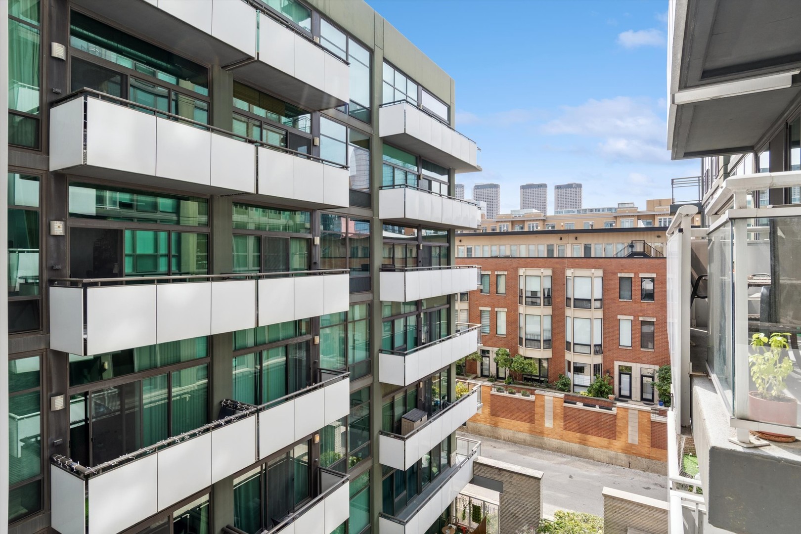 660 West Wayman Street, Unit 501 Chicago, IL 60661 - Photo 16 of 24 a city street lined with tall buildings