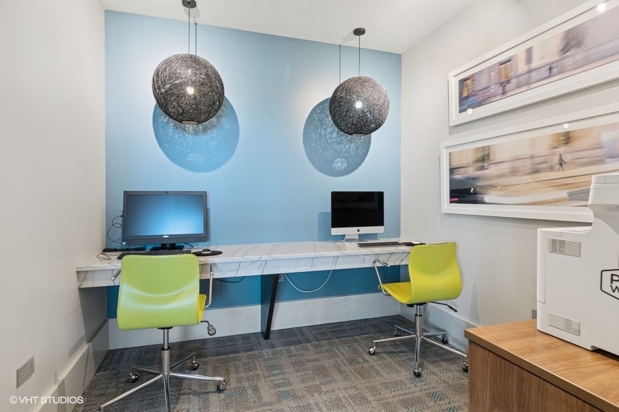 660 West Wayman Street, Unit 501 Chicago, IL 60661 - Photo 22 of 24 a work room with furniture and a mirror
