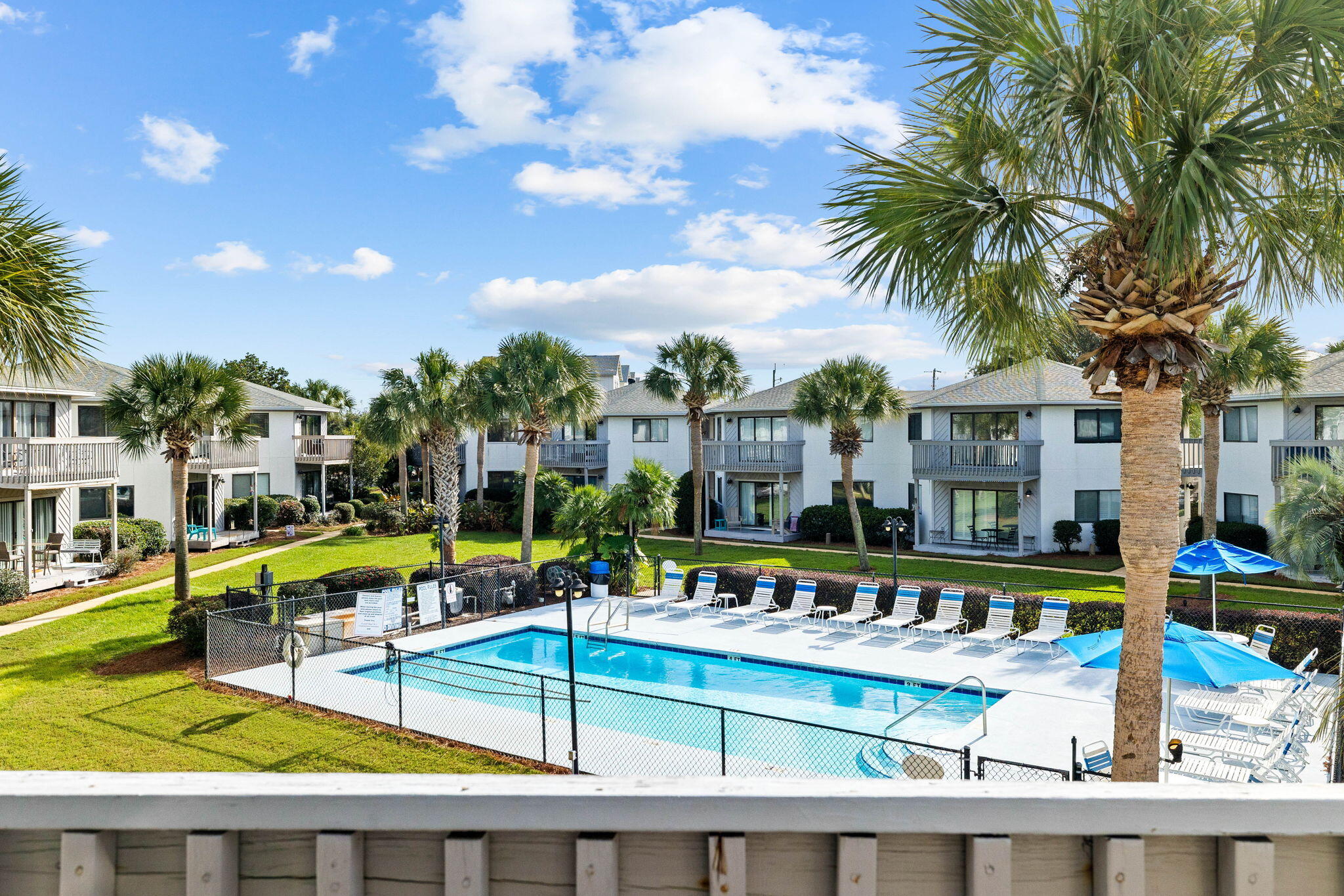 285 Payne Street, Unit 19B Destin, FL 32550 - Photo 1 of 29 a view of a house with swimming pool and sitting area