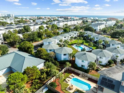 an aerial view of a house with a garden