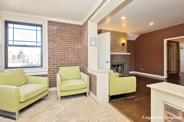 a living room with furniture and windows