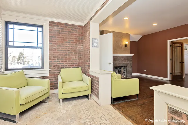 a living room with furniture and windows