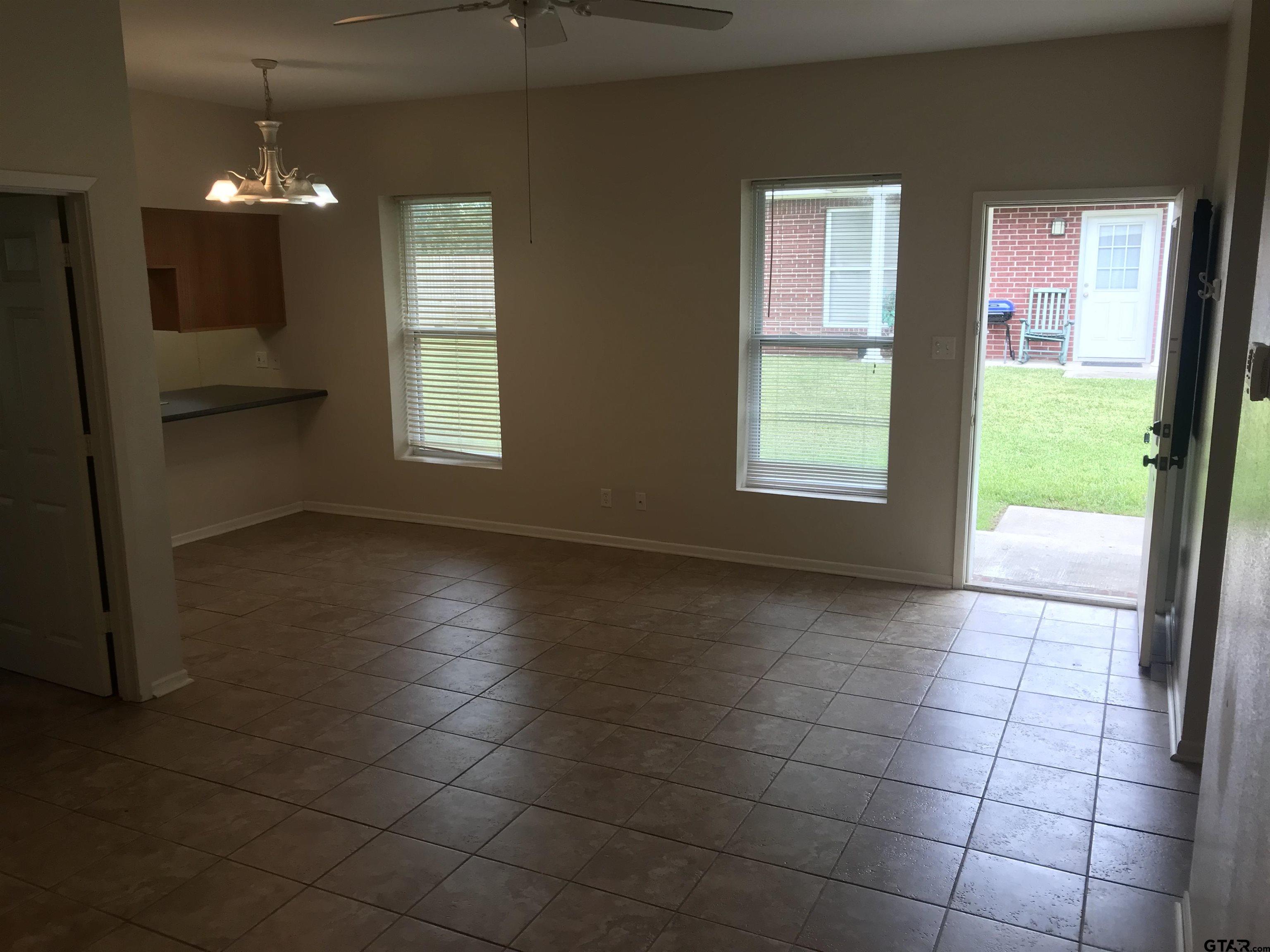 19044 FM 2493 Flint, TX 75762 - Photo 13 of 20 a view of an empty room a window and a kitchen