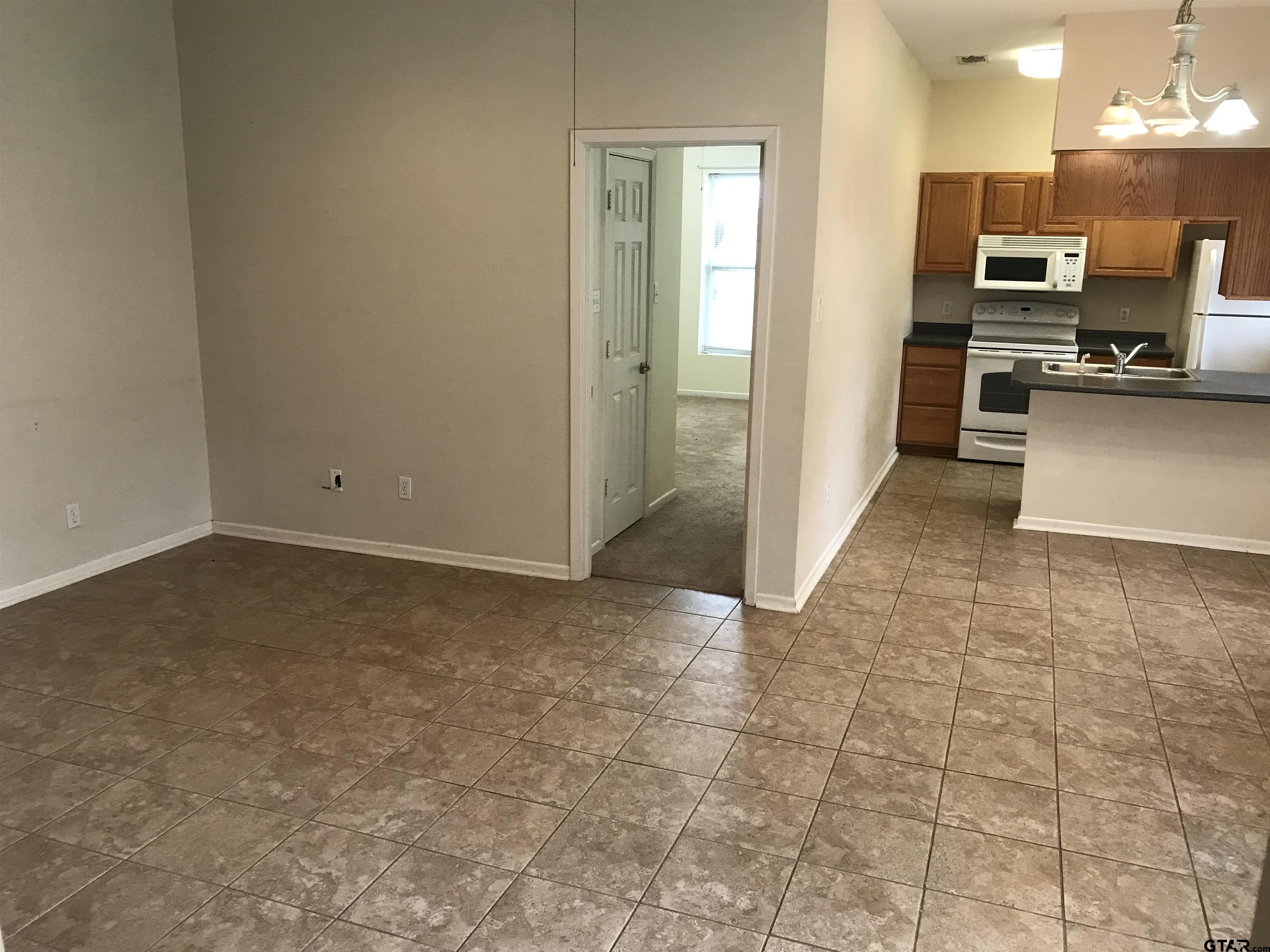 19044 FM 2493 Flint, TX 75762 - Photo 6 of 20 a view of kitchen with stainless steel appliances wooden floor and living room view