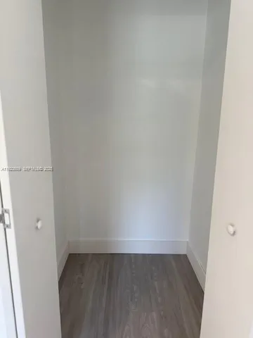 a view of a street with a houses