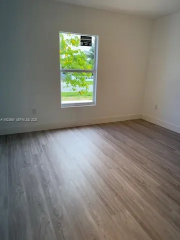 a bathroom with a toilet a sink and bathtub
