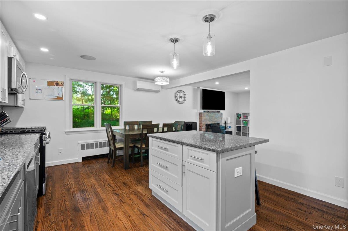 105 High St Extension Mount Kisco, NY 10549 - Photo 22 of 38 a kitchen that has a lot of cabinets in it
