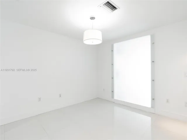 a bathroom with a bathtub and a sink