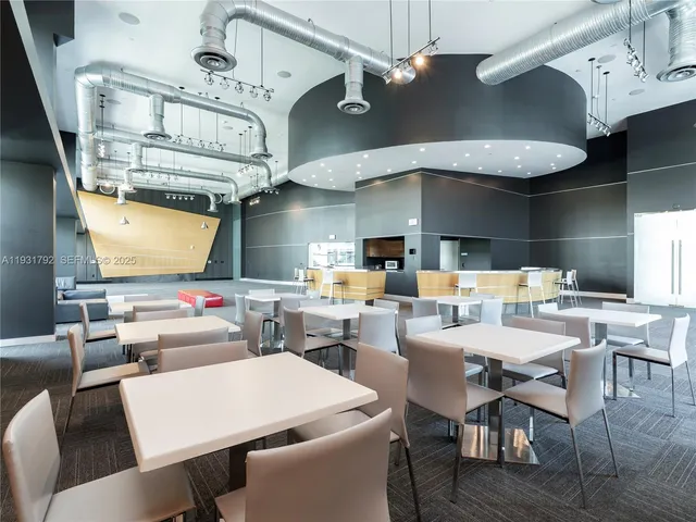 a view of a balcony with furniture