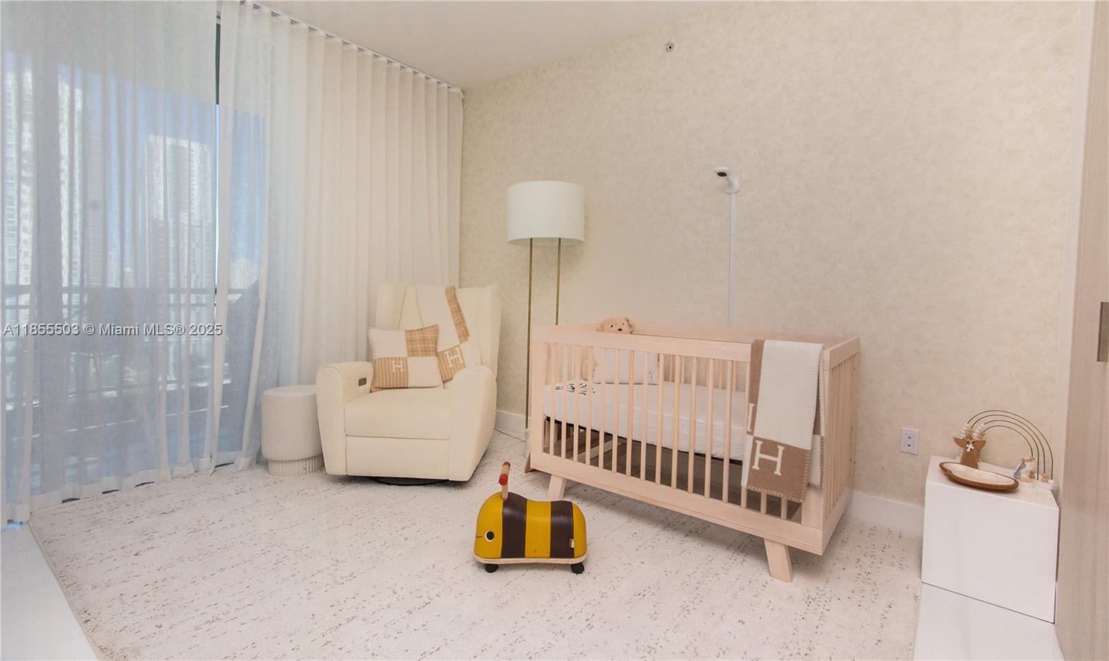 92 Southwest 3rd Street, Unit 1711 Miami, FL 33130 - Photo 26 of 54 a bedroom with furniture and a window