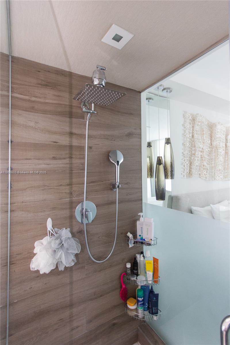 92 Southwest 3rd Street, Unit 1711 Miami, FL 33130 - Photo 33 of 54 a bathroom with a shower