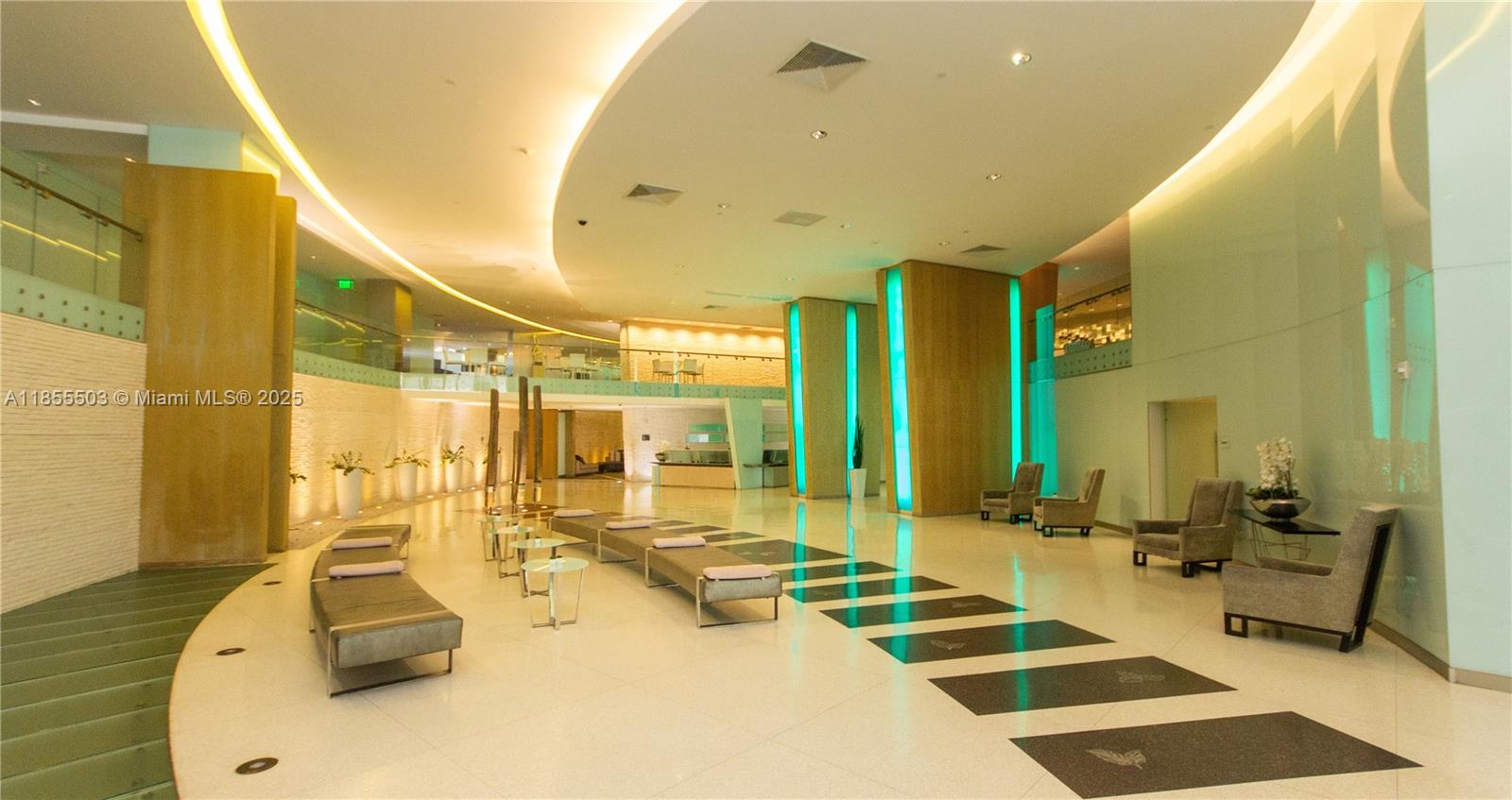 92 Southwest 3rd Street, Unit 1711 Miami, FL 33130 - Photo 46 of 54 a room with gym equipment and mirrors