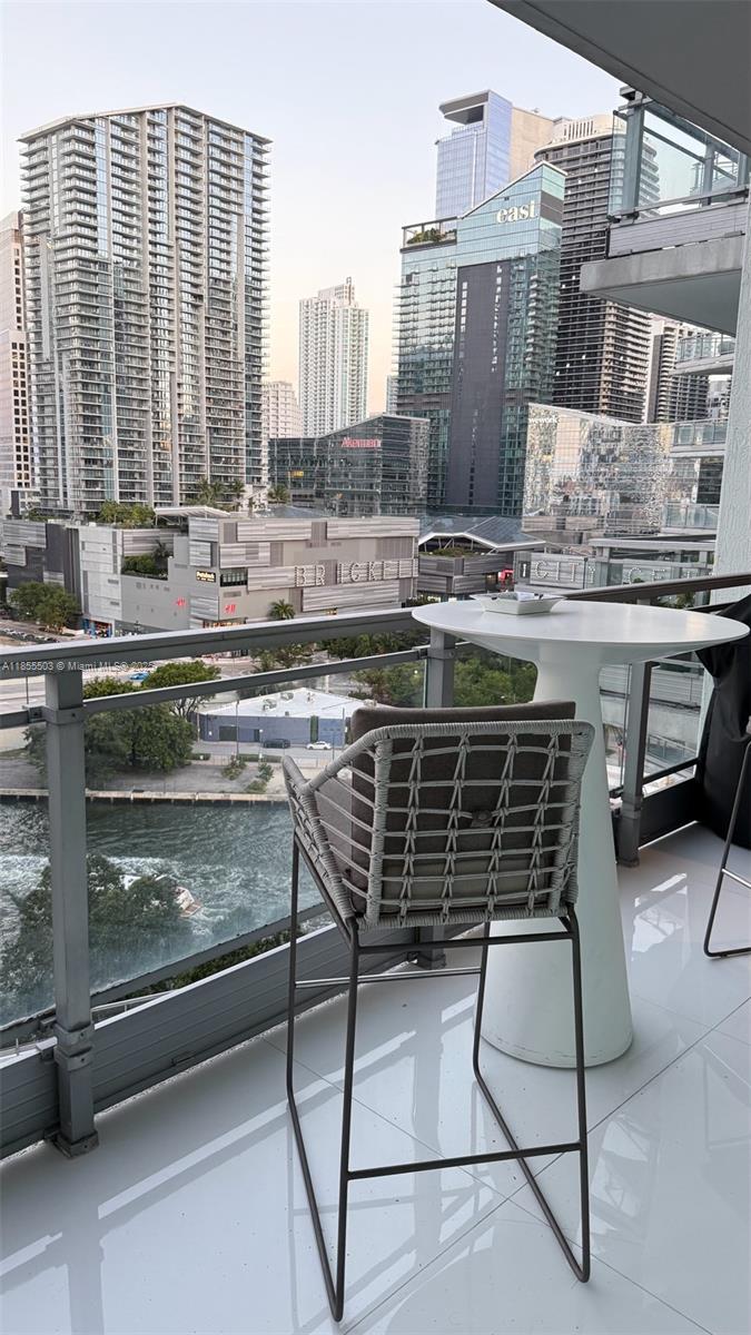 92 Southwest 3rd Street, Unit 1711 Miami, FL 33130 - Photo 49 of 54 a picture of a table and chair