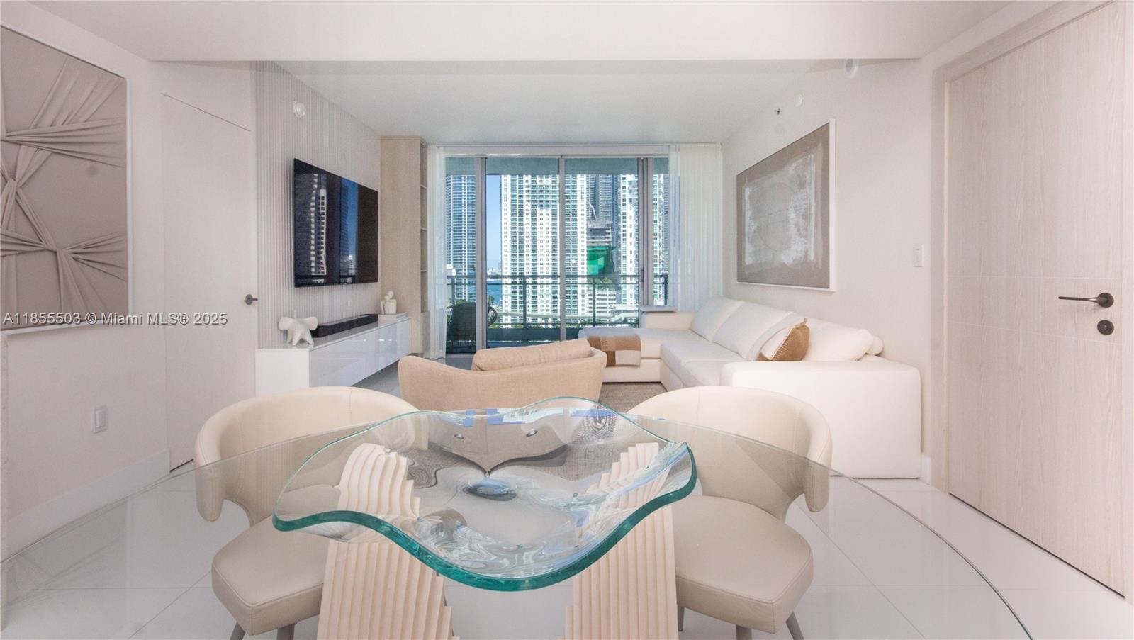 92 Southwest 3rd Street, Unit 1711 Miami, FL 33130 - Photo 10 of 54 a living room with furniture