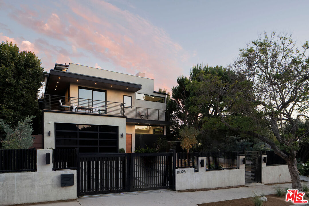 a front view of a house with yard