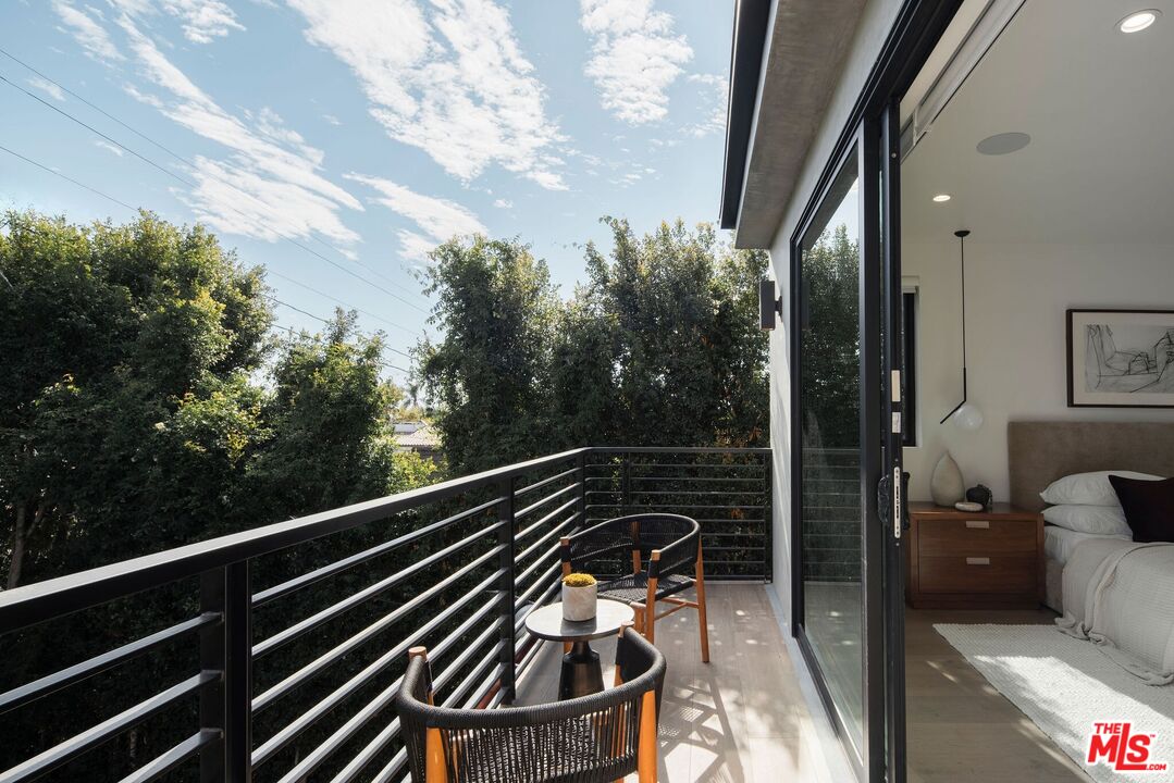 10326 Keswick Avenue Los Angeles, CA 90064 - Photo 20 of 38 a view of a balcony with a bench