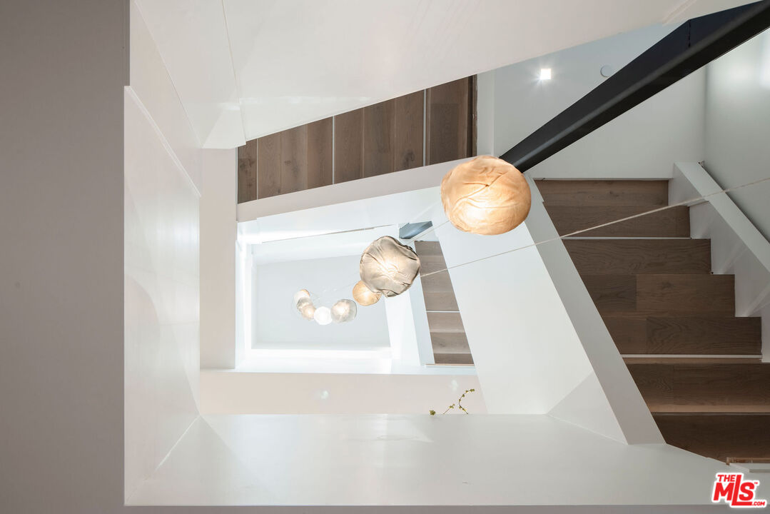 10326 Keswick Avenue Los Angeles, CA 90064 - Photo 38 of 38 a bathroom with a sink and mirror