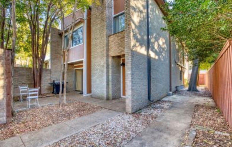 4926 Thunder Road Dallas, TX 75244 - Photo 4 of 16 a view of a building with a outdoor space and trees