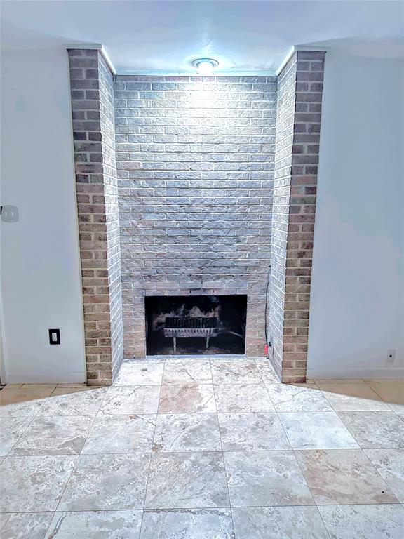 4926 Thunder Road Dallas, TX 75244 - Photo 6 of 16 a view of empty room with fireplace