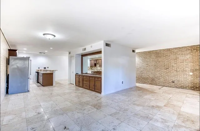 a view of a kitchen with a sink