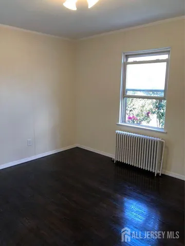 a view of small space with wooden floor