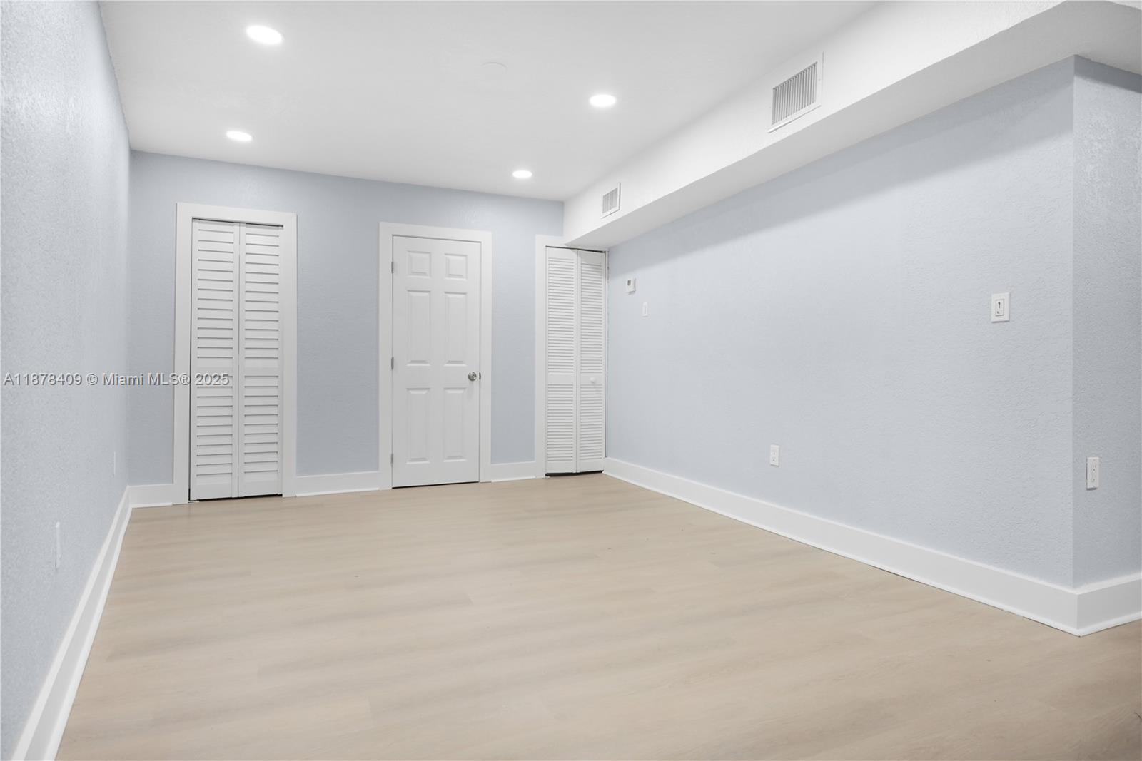 430 Southwest 15th Road Miami, FL 33129 - Photo 4 of 15 an empty room with closet area
