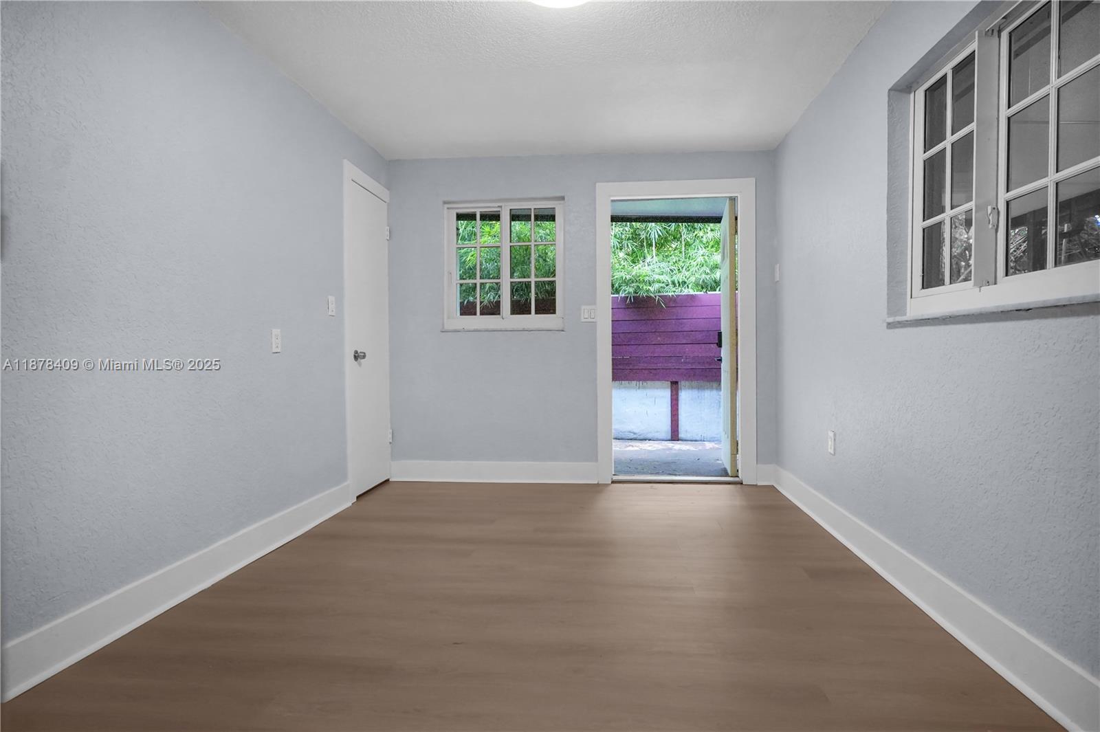 430 Southwest 15th Road Miami, FL 33129 - Photo 10 of 15 an empty room with windows