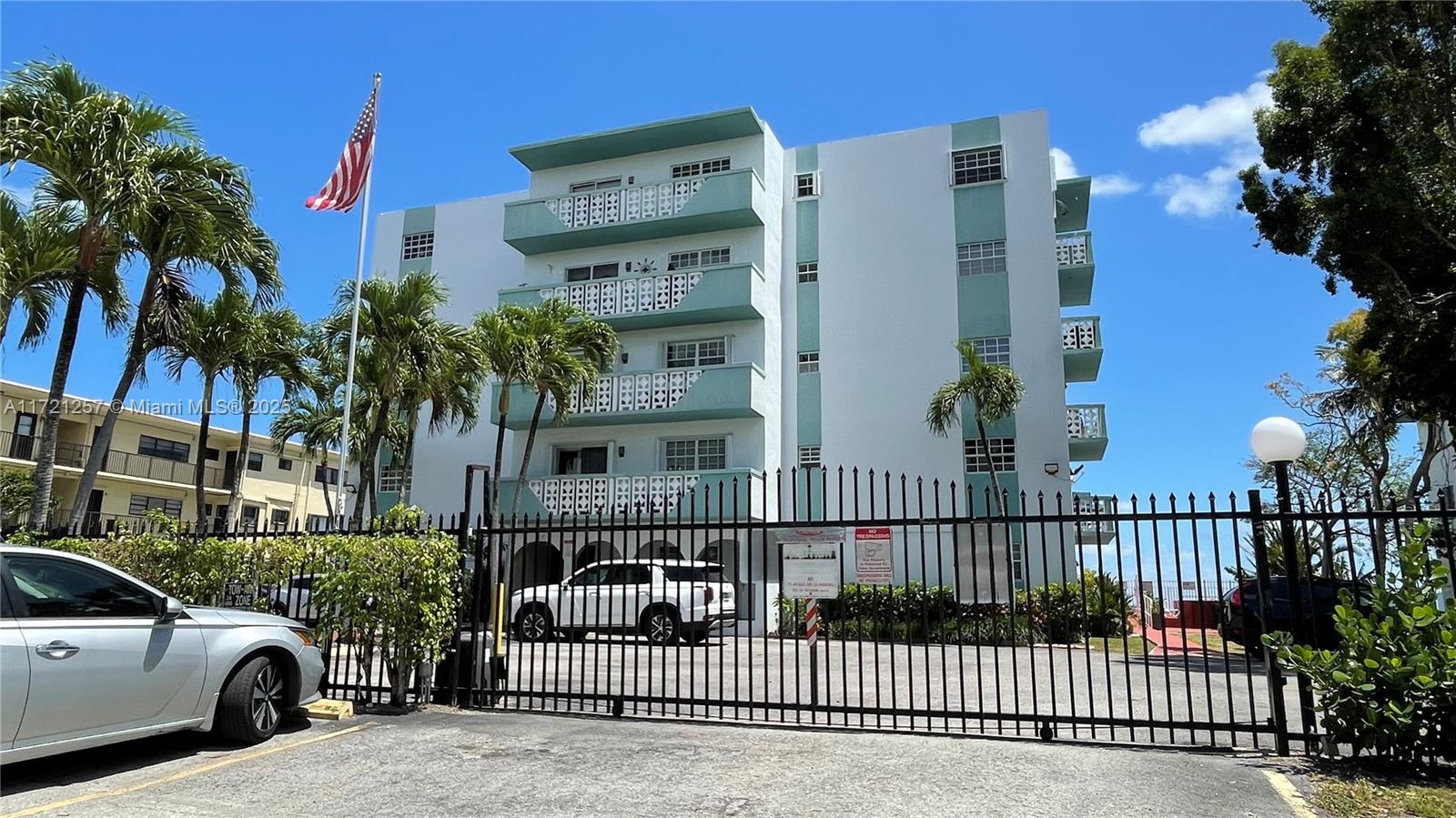 a view of a cars park side of a road