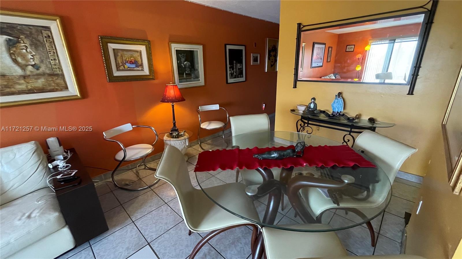 Miami Miami, FL 33138 - Photo 4 of 16 a view of a dining room with furniture a rug and wooden floor