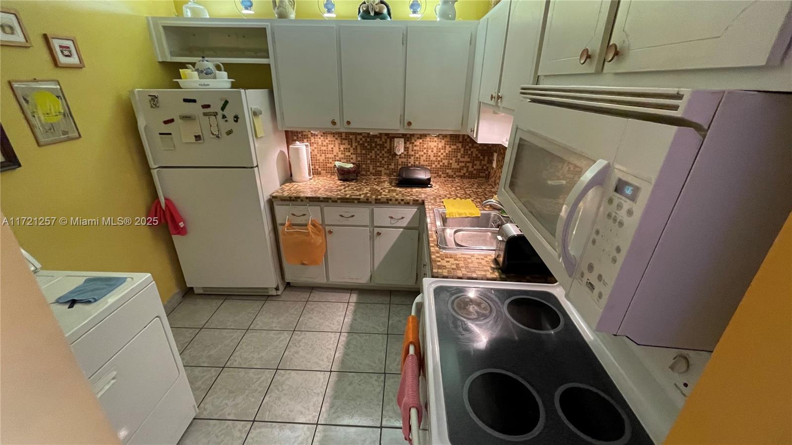 Miami Miami, FL 33138 - Photo 6 of 16 a utility room with dryer and washer