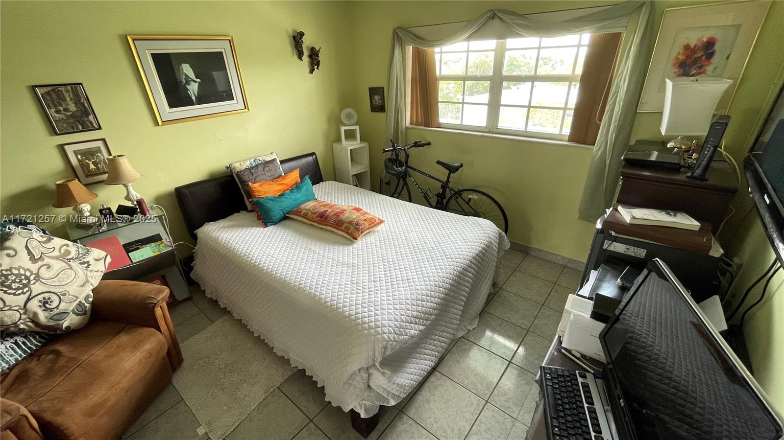 Miami Miami, FL 33138 - Photo 9 of 16 a bedroom with a bed and furniture