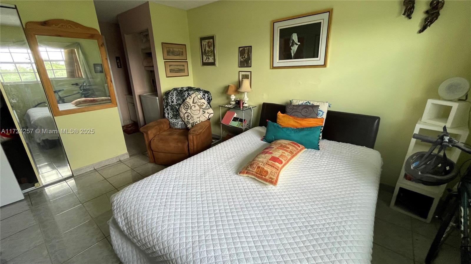 Miami Miami, FL 33138 - Photo 10 of 16 a bedroom with furniture and a window