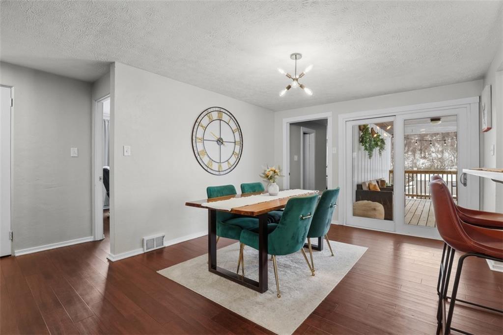 5600 5th Street Pittsburgh, PA 15236 - Photo 8 of 29 Have a peek at your deck here ... the door to the left is the primary bedroom w en suite .... off the hallway are the other 2 bedrooms and hall bath~