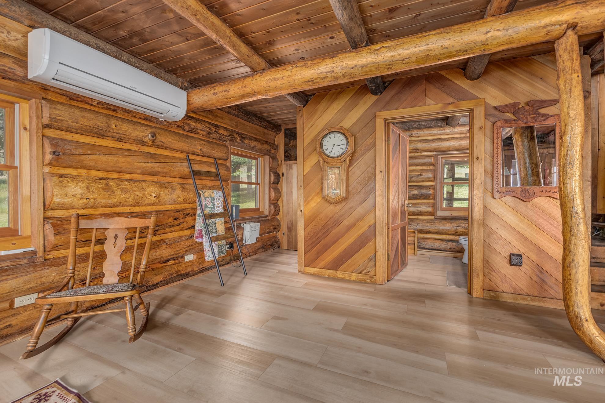 2150 Seid Creek Road Cambridge, ID 83610 - Photo 16 of 50 Rustic log construction interior featuring wood-finish flooring