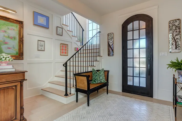 a stove top oven sitting inside of a kitchen