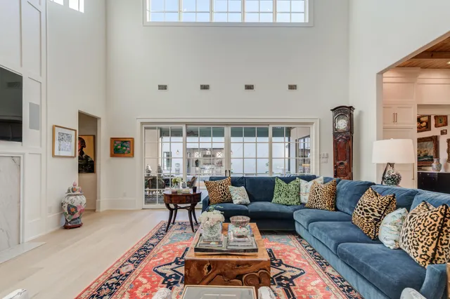a spacious bathroom with a double vanity sink and a mirror