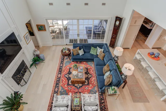 a bathroom with a sink a mirror and window