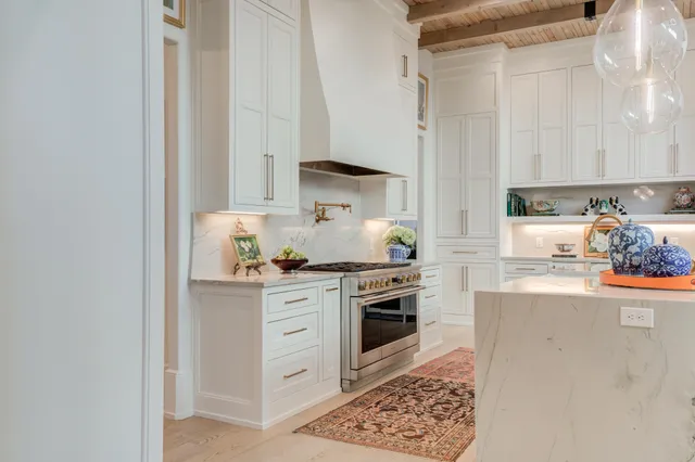 a bathroom with a sink a vanity and a mirror