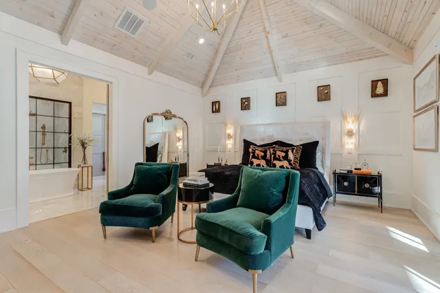 a dining room with furniture and wooden floor