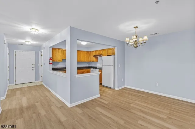 a view of livingroom with kitchen