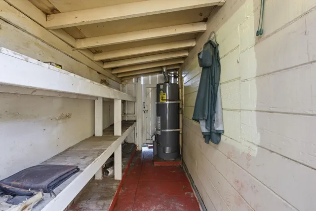 a bathroom with a sink a mirror and a shower