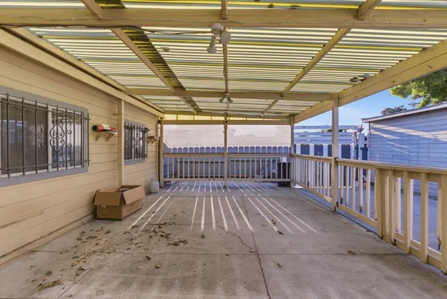 a view of a house with a street